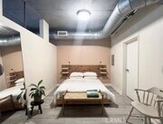 Photo - 645 W 9th St Unit 337