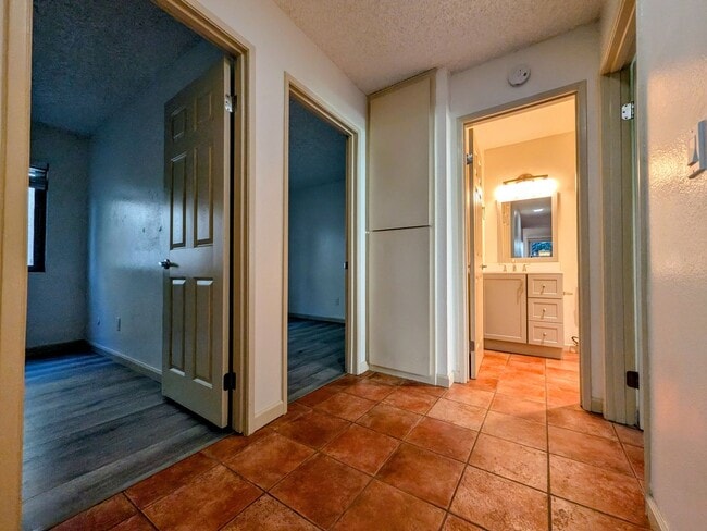 Photo - Bright and Charming 3 Bedroom 2 Bath Condo with Patio and A/C! Unit 4