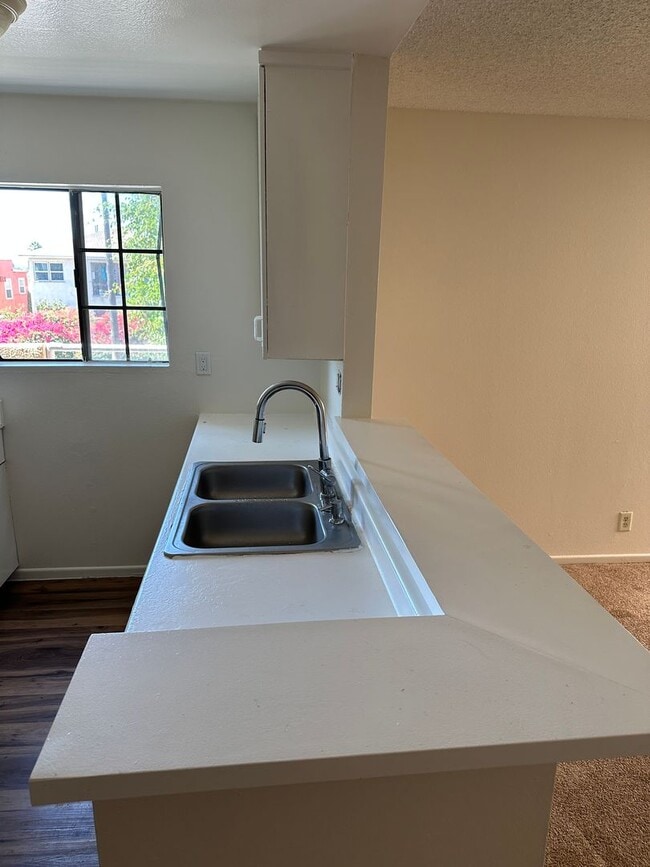 Photo - 2-Bedroom First-Floor Condo with Utilities... Unit 101