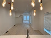 Dining Room/Entertainment Space - 42 Navy St Apartment Unit 2