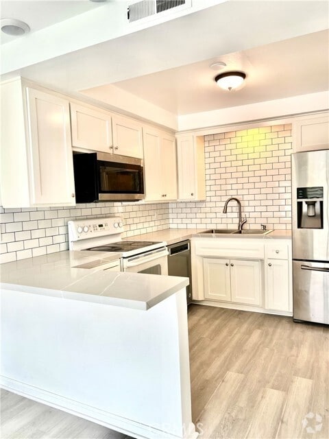 Building Photo - 1881 Mitchell Ave Unit 36 Rental