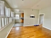 Living, dining, and kitchen - 308 Encino Ln Apartments Unit A