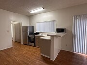 Kitchen Area W/Breakfast Bar - 11755 Dorothy St Apartments