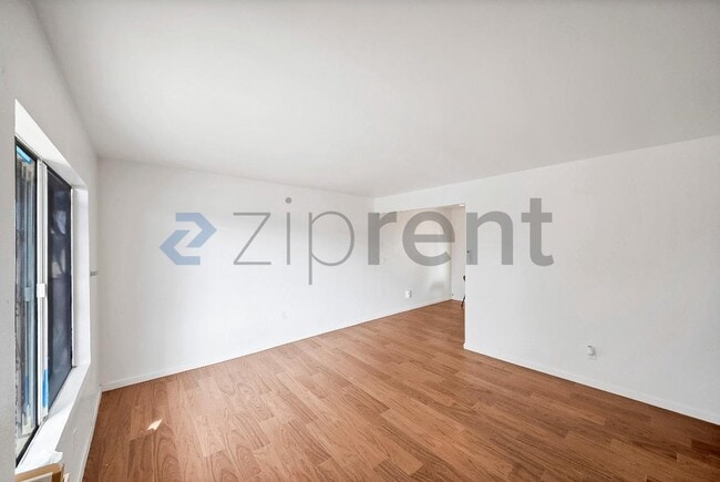 Building Photo - 2458 Normandie Ave