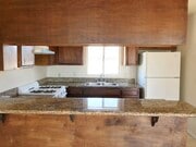 Kitchen with Granite counters - 4553 W 116th St Unit 1