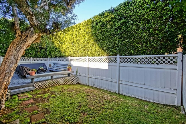 Photo - CHARMING & SPACIOUS, 5BR3.5BA HOME W/ PRIVATE YARD, BALCONY & SPRAWLING LIVING SPACE NEXT TO SAND...