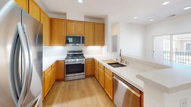 Photo - Modern 2BR/2BA Rancho Cucamonga Condo with 2 Balconies & 2-Car Garage – No Carpet! Unit 45