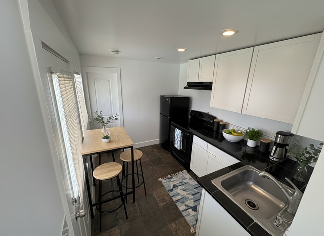 Virtually staged kitchen - 1740 Whitefield Rd