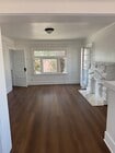 Large living room space with private balcony - 2030 6th Ave Apartments Unit 2030 1.2