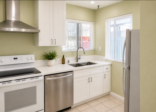 BRAND NEW REMODELED Kitchen: New countertops, cabinets, sink, faucet, blinds and appliances - 4425 Kansas St Unit 3