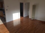 living room with lots of light - 2611 Mathews Ave Unit 5