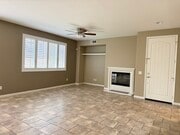 Living room with Plantation shutters - 28377 Mirabelle Ln