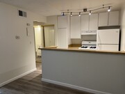 Kitchen and hallway - 18645 Hatteras St Unit 109