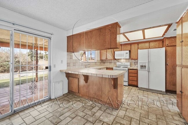 Photo - Single-Story 3 Bed with Covered Patio & Gated Yard