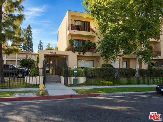 Building Photo - 6825 Alabama Ave Unit 311