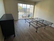 Master Bedroom with Balcony. - 4750 Templeton St Condo Unit 1201