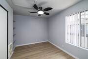 Seagrass - Remodeled Bedroom - Salt & Vine Oceanside Apartments