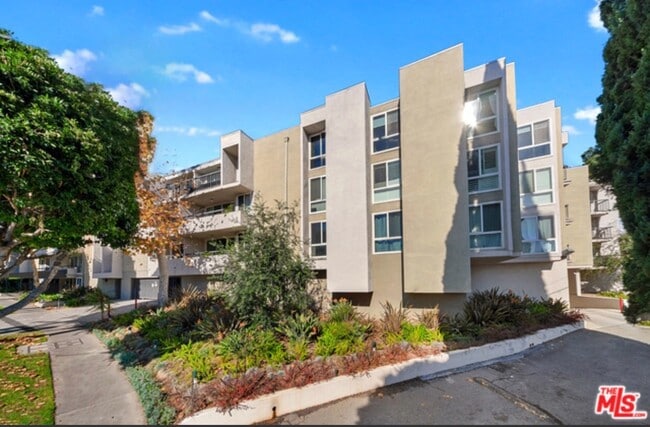 Front of building - 8535 Knoll N W Dr Unit 106