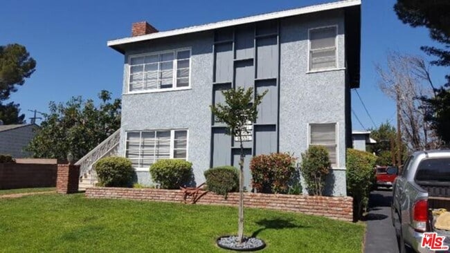 Building Photo - 5029 Cartwright Ave Unit 5029 1/2