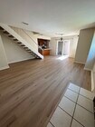 Living Room with Fireplace - 13784 Sycamore Tree Ln Townhome