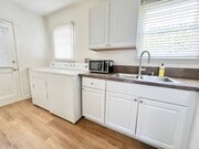 Photo - Charming 2-Bedroom Home with Hardwood Floors & Fireplace Near the Traffic Circle Unit 4510 E 15th St