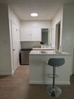 Bachelor with Hardwood Floor - Studio Village Apartments