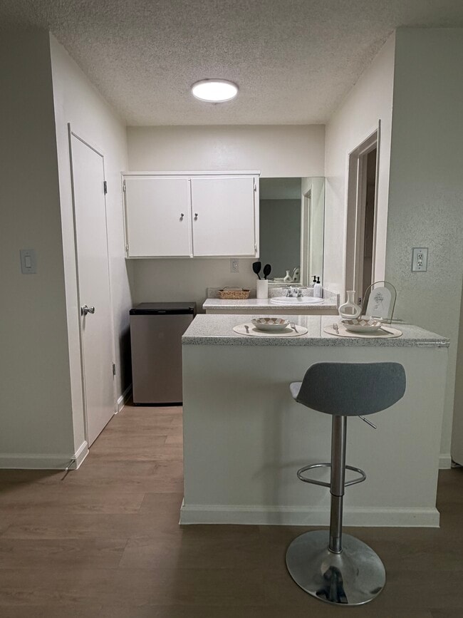 Bachelor with Hardwood Floor - Studio Village Apartments