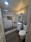 Fully remodeled bathroom w/ luxury stone shower and sliding doors - 18173 Brightman Ave