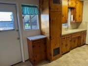 back door, pine cabinets - 7135 Mohawk St House
