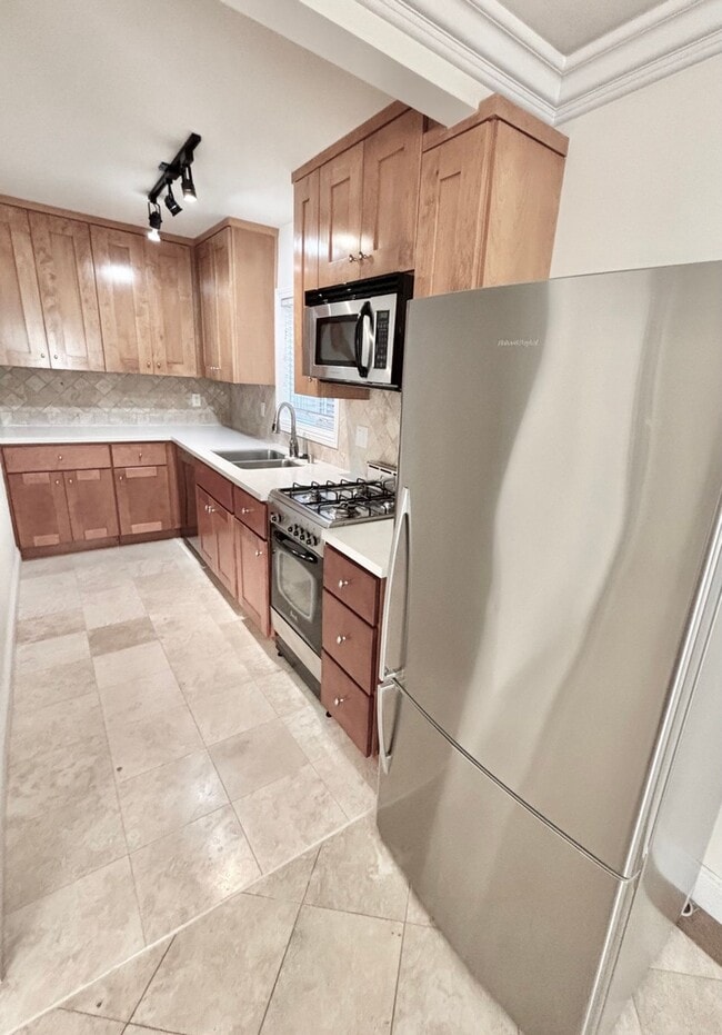 Photo - Beachside Living Just One Block from the Sand – Updated 1BD with Garage Parking Unit 208