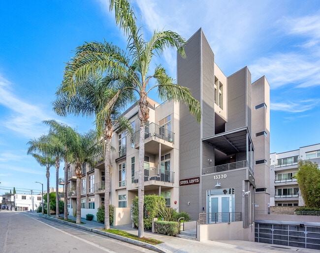 Building Photo - 13320 Beach Ave Unit #202