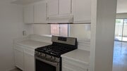 Kitchen Pass Through - 10125 De Soto Ave Townhome