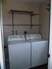 Laundry room just off kitchen - 8438 Summerdale Rd Condo Unit C