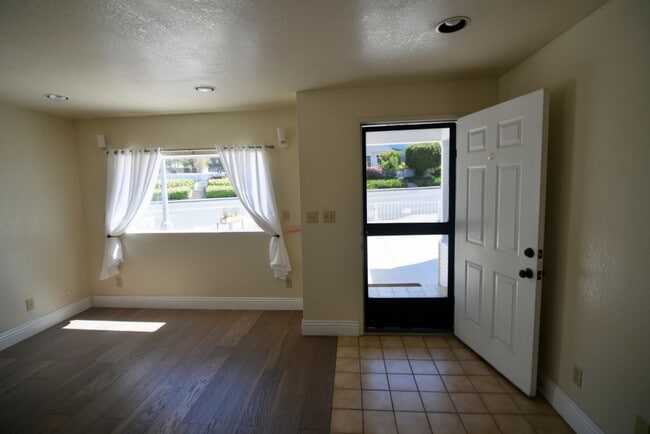 Living Room and Front Door - 111 N Pacific Coast Hwy Unit 111