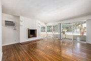 2BR, 2BA - 950SF - Living Room - Holiday Manor