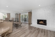 3BD, 2BA - 1,600SF - Living Room - 1408 Barry Ave Apartments