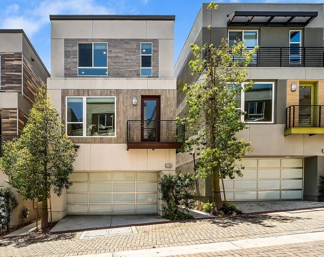 Building Photo - Tucked within the Hollywood Hills in a gated community