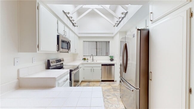 Building Photo - 5357 Algarrobo Unit Q