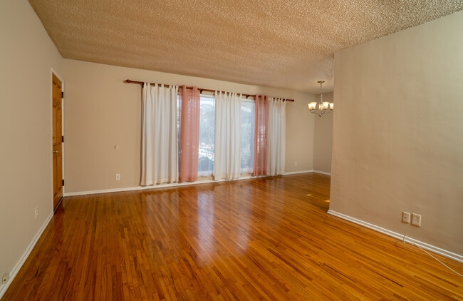 Living Room/Dining Area - 2318 10th St Apartments Unit 1