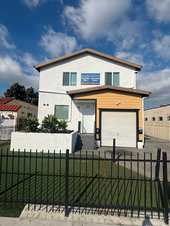 Building Photo - 1029 W 65th Pl