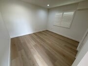 1ST BEDROOM NEW FLOORING - 646 N Serrano Ave Apartment