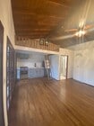 Charming hard wood floors, vaulted wood ceilings and loft - 836 S Genesee Ave Unit 1
