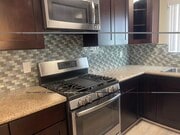 Everything you need: 4 burner gas stove, Microwave, garbage disposal, dishwasher. fridge - 2411 Prospect Ave Unit 107