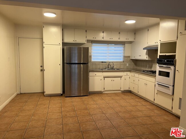 Photo - 469 W 19th St Apartment Unit 1