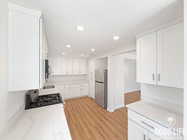 Photo - Charming 3B/2BA Home with Attached Garage, Large Yard and Modern Comforts in Quiet Baseball Field... Unit 4765