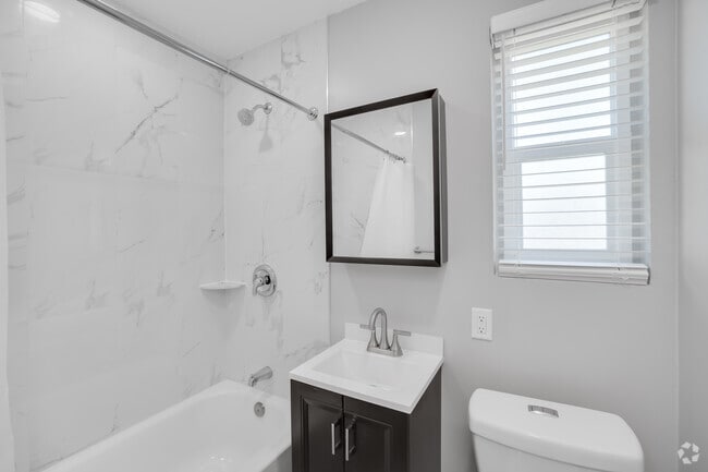 2BR, 1BA - 847SF - Bathroom - Village Apartments