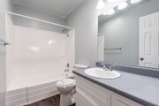 1BR, 1BA - 725SF - BATHROOM - The Mediterranean Apartments