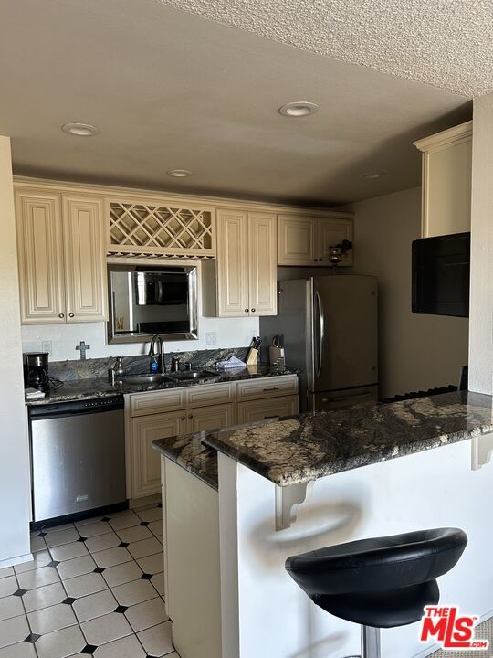 Photo - 6600 Warner Ave Unit 84