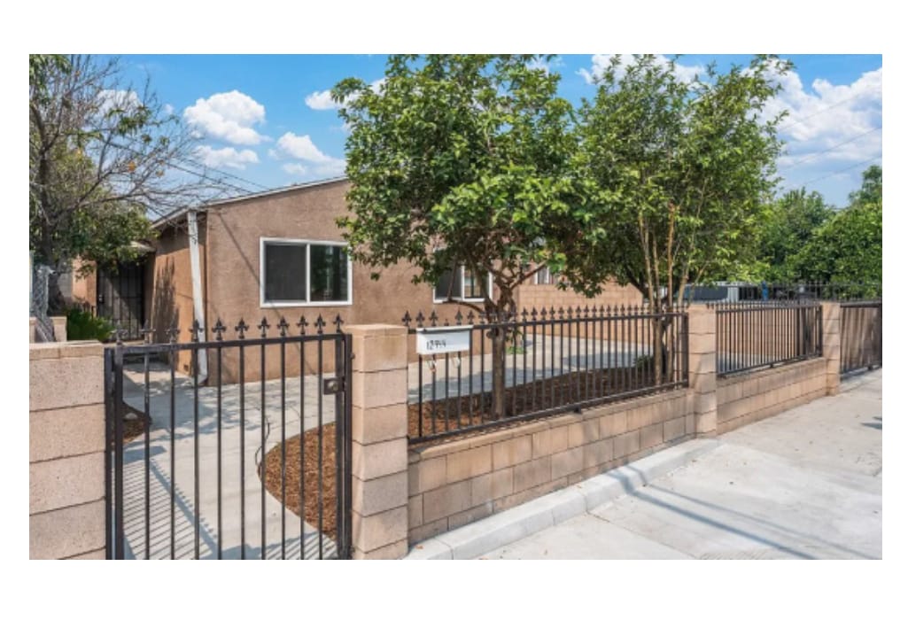 Main entrance view from the sidewalk - 12944 Bess Ave House