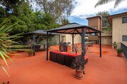 Outdoor Living/BBQ Area - Harbor Verde Apartments